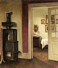 Carl Vilhelm Holsoe An Interior with a Stove and a View into a Dining Room painting